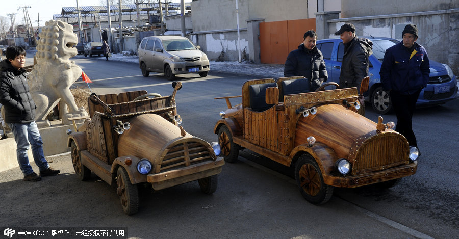 Carpenter creates e-vehicle with wood in Shenyang