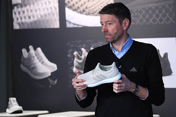 Adidas boss plans fast-fashion business to catch up with rivals