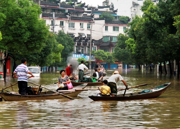 Residents evacuate amid worst floods in 56 yrs