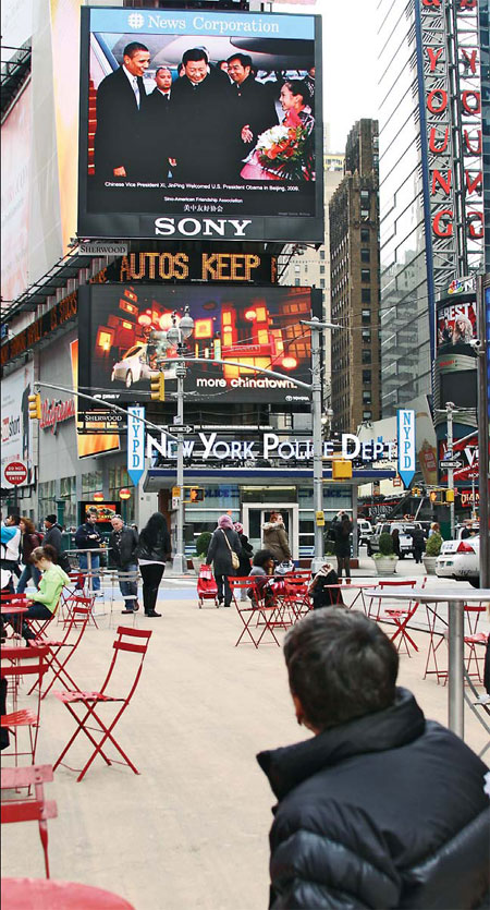 Video in Times Square greets leader