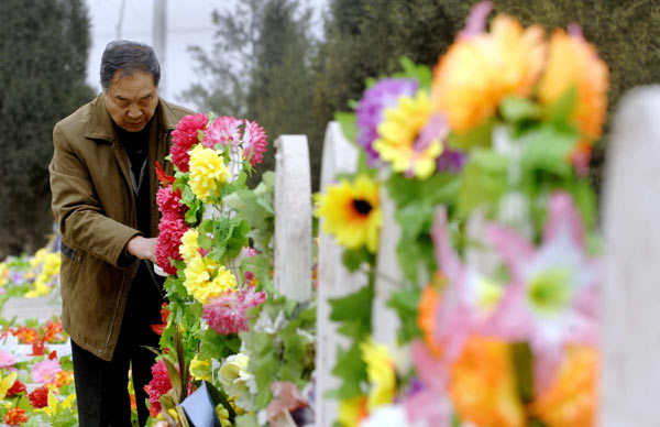 Silk Flowers brighten tombs