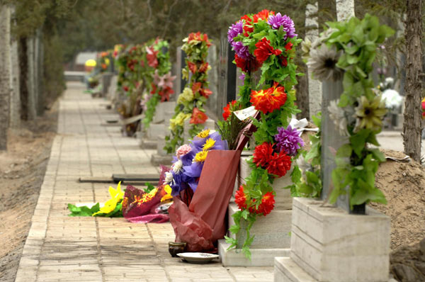 Silk Flowers brighten tombs