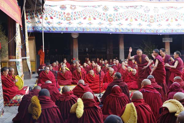 10 monks pass highest Tibetan Buddhism exam