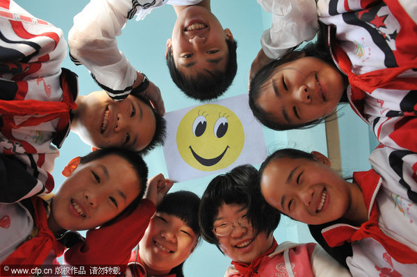 Smiling faces embrace World Smile Day
