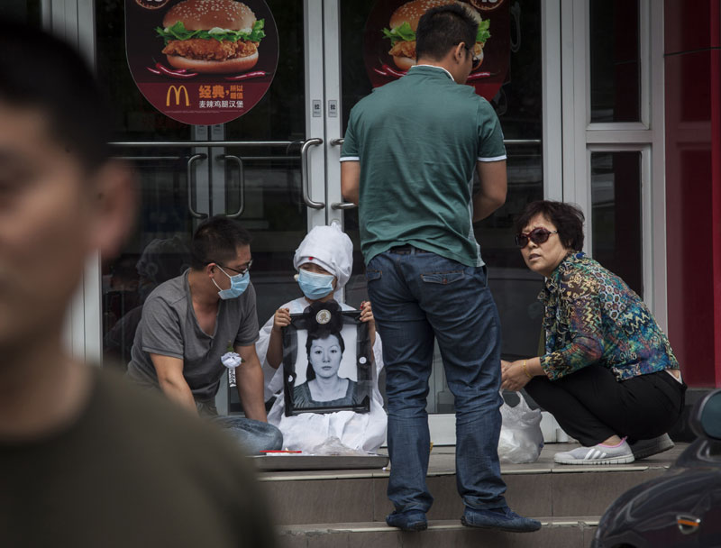 Fatal beating at McDonald's spurs tighter cult crackdown