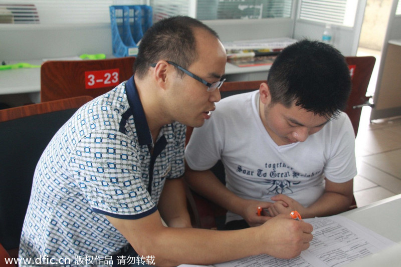 Schoolboy heroes to sit <EM>gaokao</EM> a month late