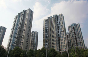 China eases home purchase restriction