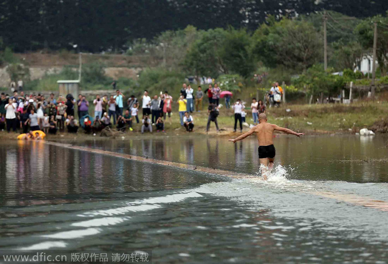 Shaolin monk makes a splash with water walk