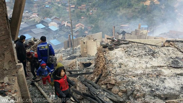 Fire engulfs ethnic village in SW China