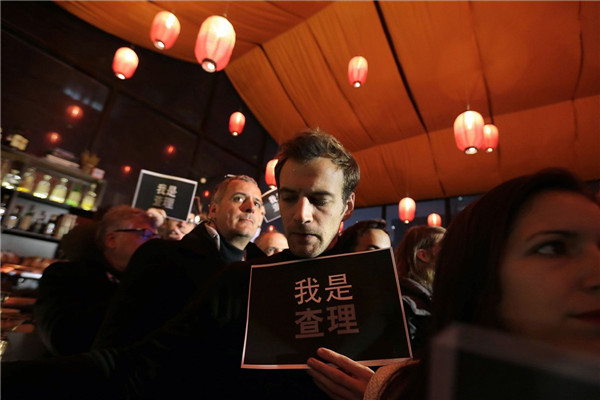 Foreign press mourns Paris victims in Beijing
