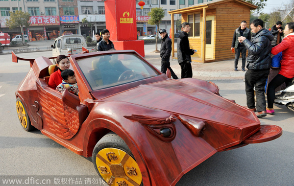 Farmer builds sports car out of wood