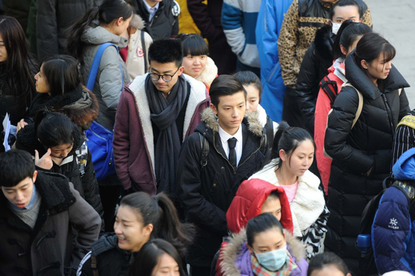 Smiles, worries, spears at college entrance exam