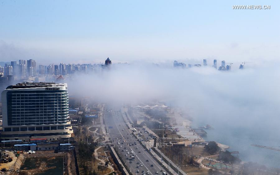 Buildings covered by fog in China's Qingdao
