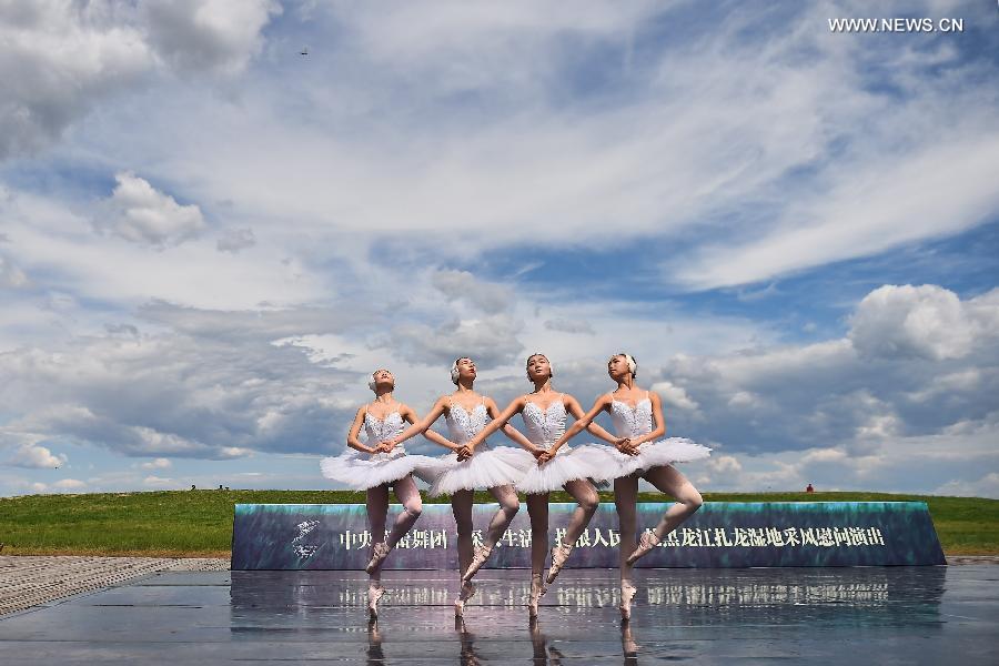 Ballet dancers perform at Zhalong National Nature Reserve in China's Qiqihar