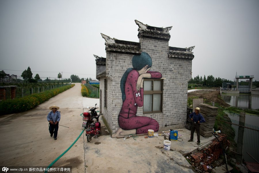 French street artist finds inspiration in Shanghai village