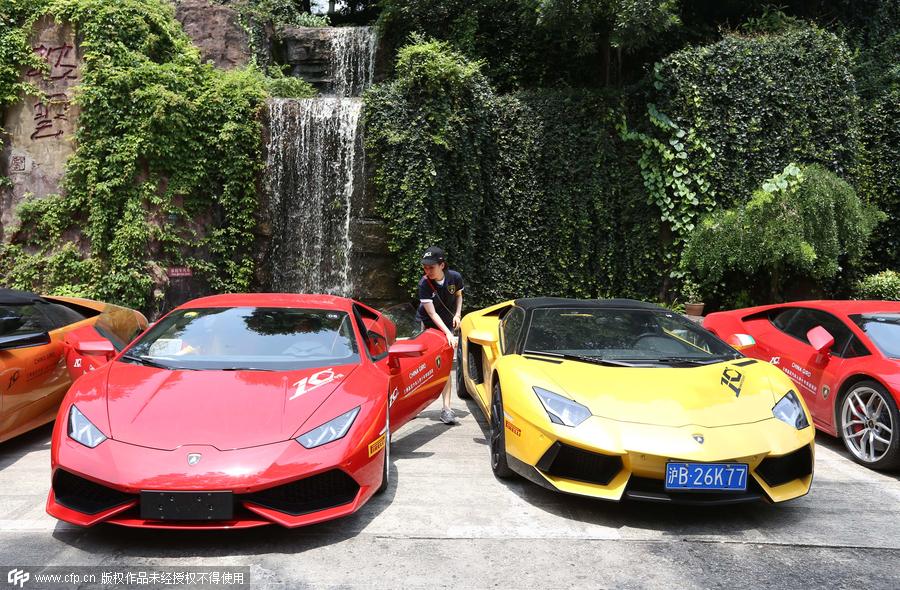 High-end sports cars rally in ancient town