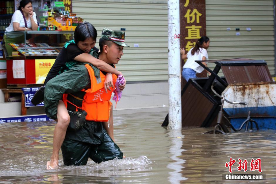People evacuated after downpour in SW China