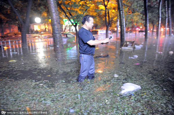 Heavy rain hits Beijing[3]|chinadaily.com.cn