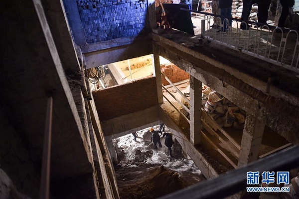 Huge illegal basement being backfilled in downtown Beijing