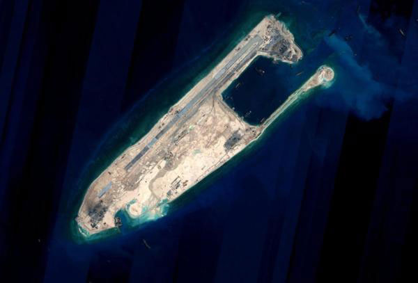 Test flight to South China Sea reef 'within sovereignty': FM
