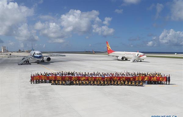 China conducts successful test flights at newly-built airfield in South China Sea