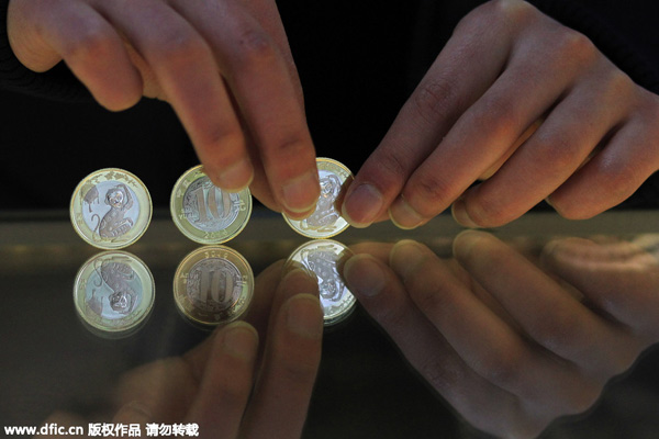 Commemorative coins for Year of Monkey issued across China