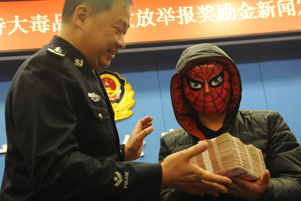 Whistleblower wears Spiderman mask to receive $68,400 award