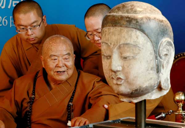 Stolen Buddha head finally returns home