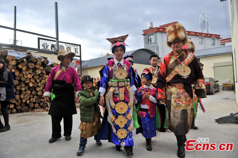 Young couple holds traditional Tibetan wedding ceremony