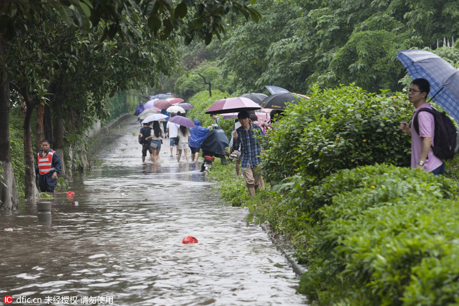 Heavy rains flood streets in Guangzhou