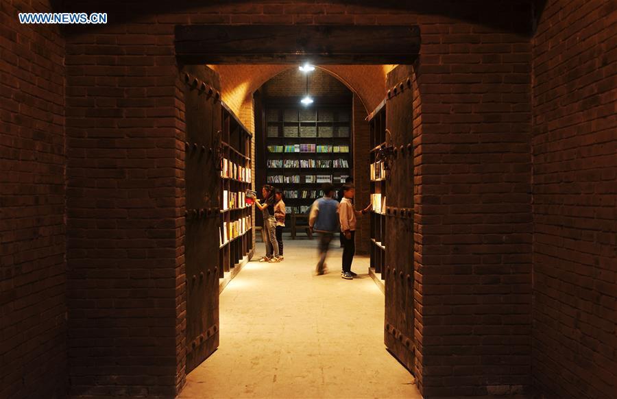 Library modified from cave dwellings attracts readers in NW China