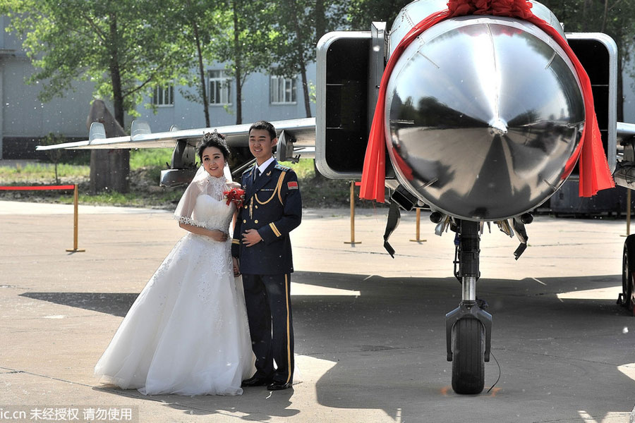 Military-style wedding: Fighter jets, grooms in dashing uniforms