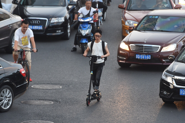Scooters banned from roads in Beijing, Shanghai
