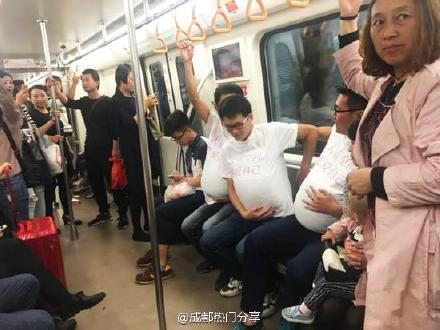 'Pregnant' men in Chengdu subway call for more freedom for pregnant women