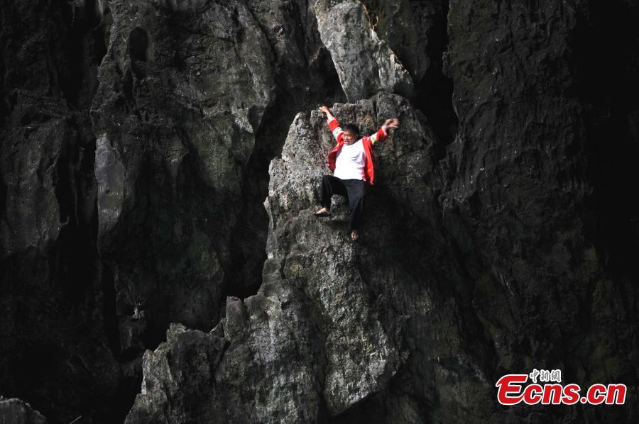 Real life spiderman scales cliff without safety equipment