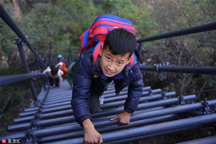 Steel ladder opens safer path for cliff village children