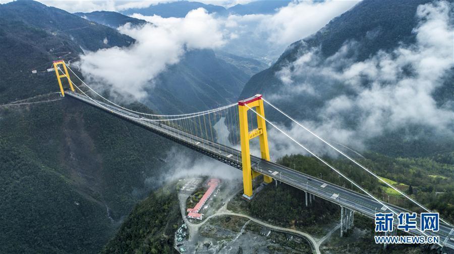 Mystical foggy view of Sidu River Bridge in Central China