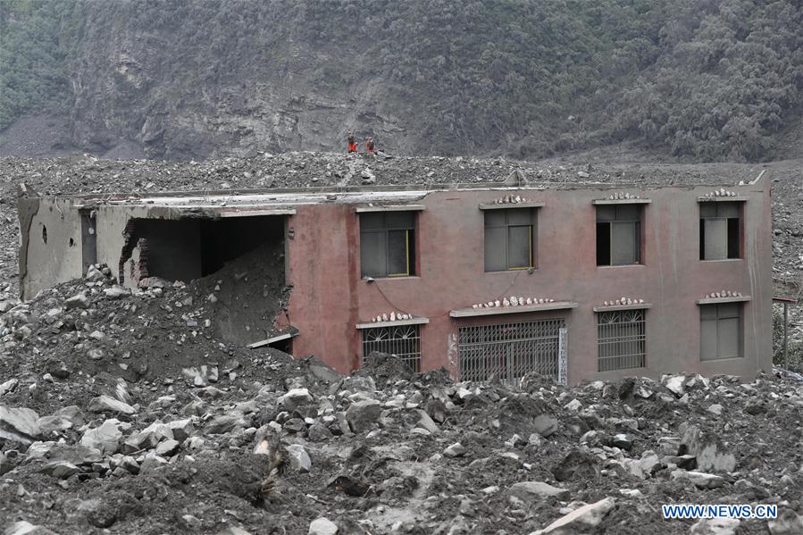 Rescue work underway after SW China's devastated landslide
