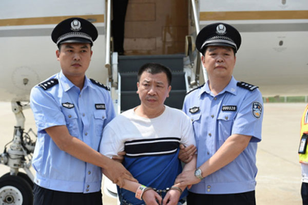 Chinese 'Red Notice' fugitive repatriated from US