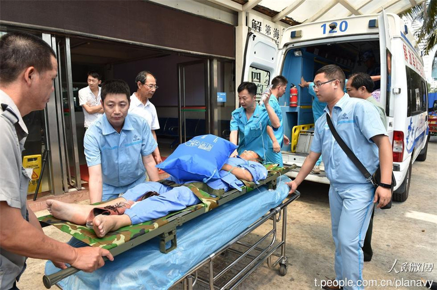 PLA plane lands at Yongshu Jiao reef to help patients