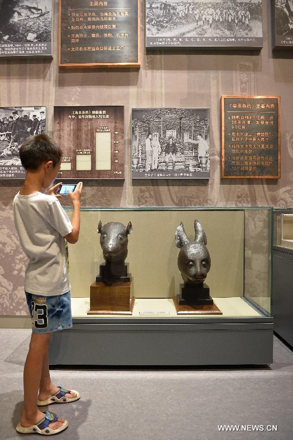 Rat, rabbit head sculptures on display
