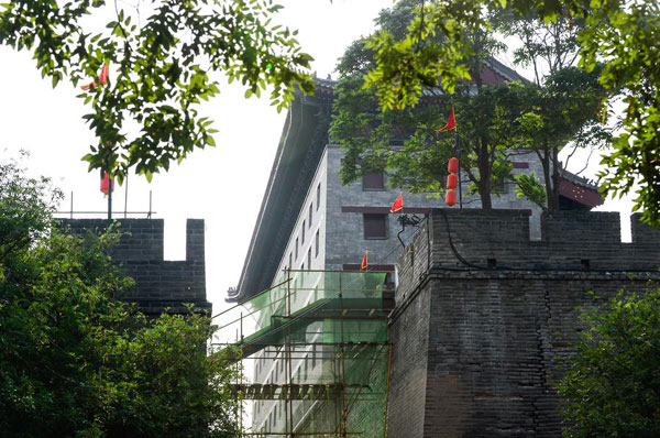 Elevator construction mars ancient walls in Xi'an