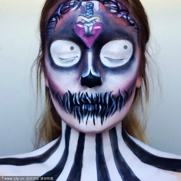 Make-up artist creates special-effects on her face