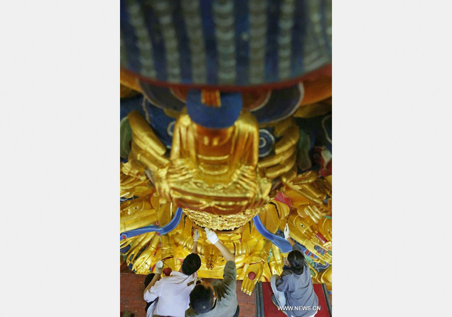 Restoration work of Guanyin sculpture enters final phase