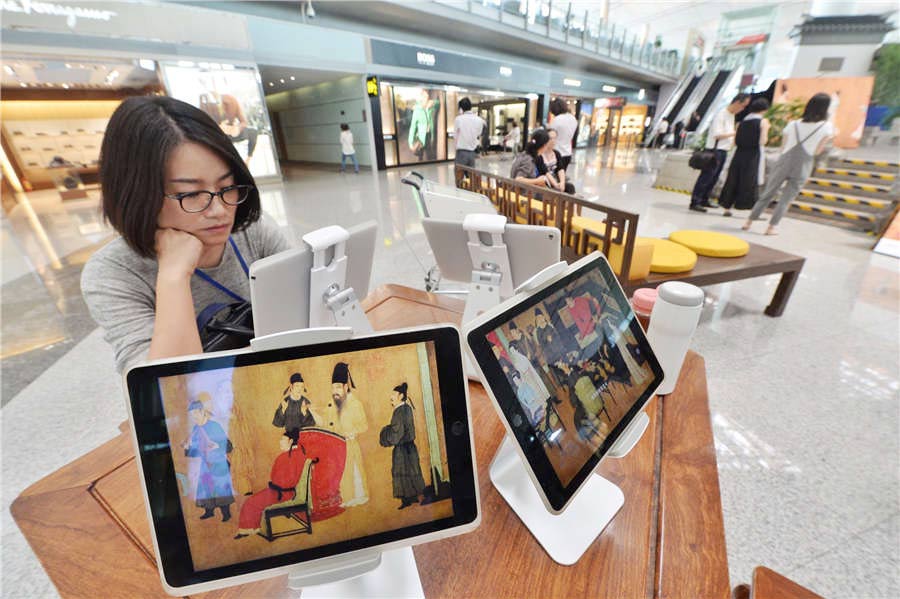 Ancient scroll's digital art show staged in Beijing airport