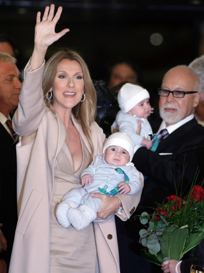Celine Dion arrives at Caesars Palace with her husband and sons