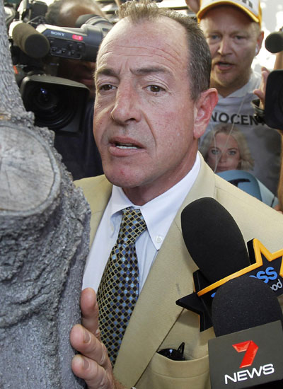 Michael Lohan pleads not guilty to attacking ex