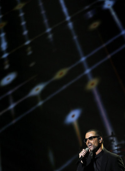 George Michael performs during his concert in Prague