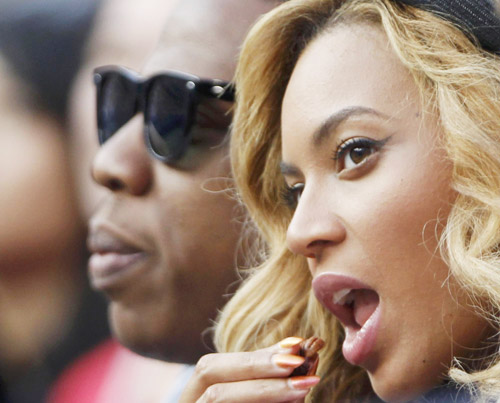 Jay-Z and Beyonce attend the match between Djokovic and Nadal