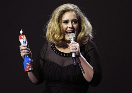 Adele breaks Whitney Houston's chart record